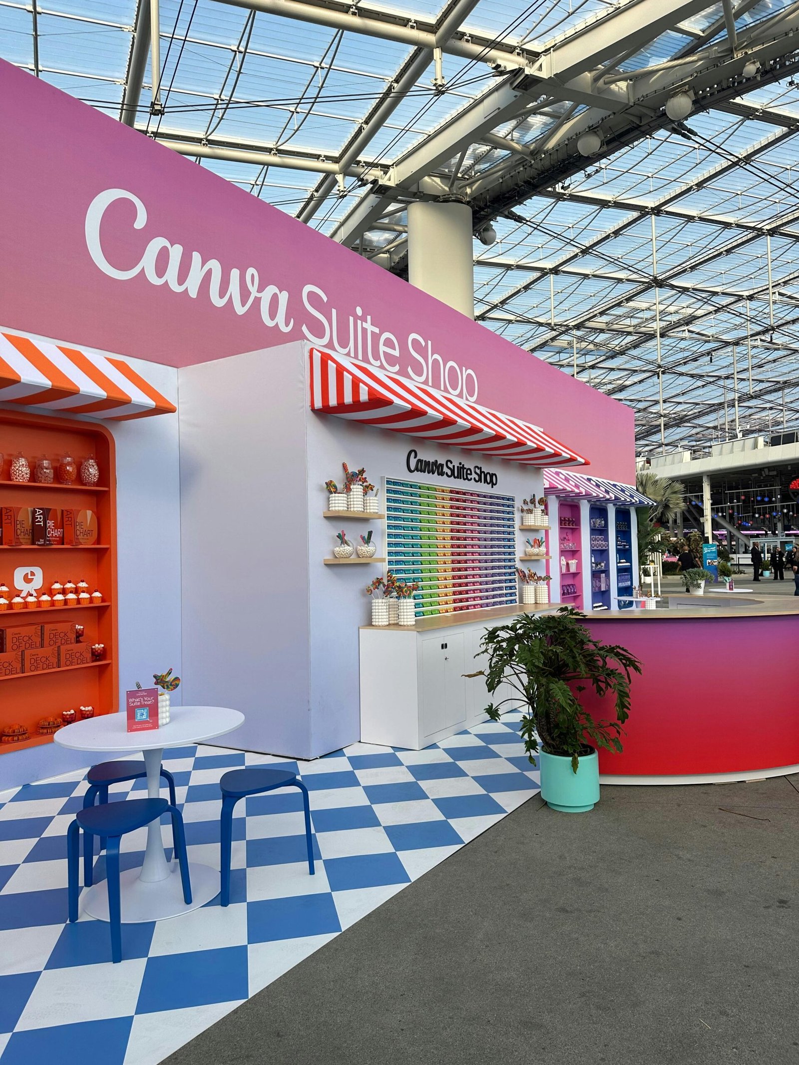 Bright and colorful indoor exhibit at the Canva Suite Shop with vibrant decorations.
